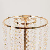 Gold jewelry stand with crystal accents, showcasing elegant design.