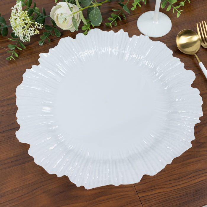Elegant white ruffled plate on a wooden table.