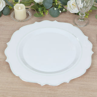 <span style="background-color:transparent;color:#1d1f25;">Exquisite White Plastic Charger Plates with a Silver Scalloped Rim</span>