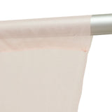 Sheer beige curtain fabric on silver rod, close-up texture detail