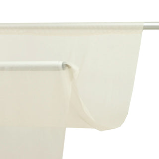Cream translucent shower curtain on white rod, close-up tear detail