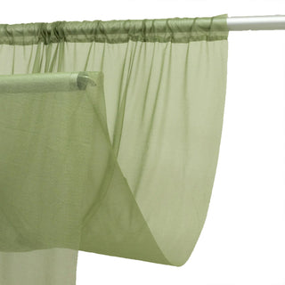 Light green sheer curtain on a metal rod, decorative window drape