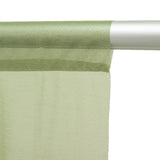 Light green sheer fabric roll with textured woven curtain material