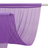 Purple sheer window curtain panel hanging on a silver rod