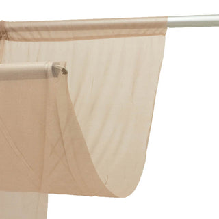 Sheer beige curtain panel on metal rod with subtle trim