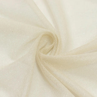 Cream sheer tulle fabric close-up with soft swirl texture#whtbkgd