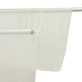 Semi sheer white curtain on rod, close-up window treatment detail