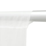 White fabric towel hanging on a modern chrome bar, close-up