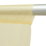 Close-up of beige fabric ribbon wrapped around a silver pole