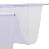 Sheer white curtain on rod with lavender header trim