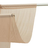 Beige sheer curtain panel hanging on a rod