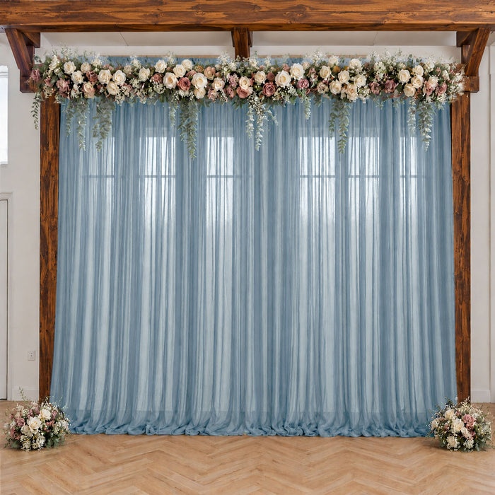 Elegant blue sheer wedding backdrop with floral garland and wood frame