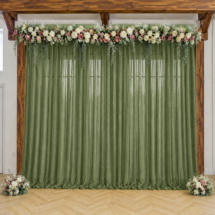 Green sheer wedding backdrop with floral garland and wooden arch frame