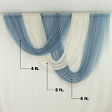 Blue and white draped sheer curtains 