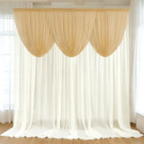 Sheer cream curtains draped elegantly in a bright room.