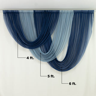 Elegant blue and gray curtain drapery on a light backdrop.