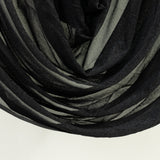Close-up black sheer curtain fabric on white backdrop #whtbkgd