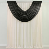 Black and white draped curtain fabric in studio-style isolation shot