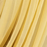 Yellow sheer fabric drapes in various shades and textures. #whtbkgd