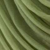 Textured green fabric draped in elegant folds. #whtbkgd