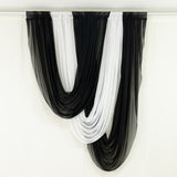 Black and white sheer curtain set hanging on rod #whtbkgd