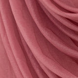 Soft pink sheer fabric with draped texture. #whtbkgd