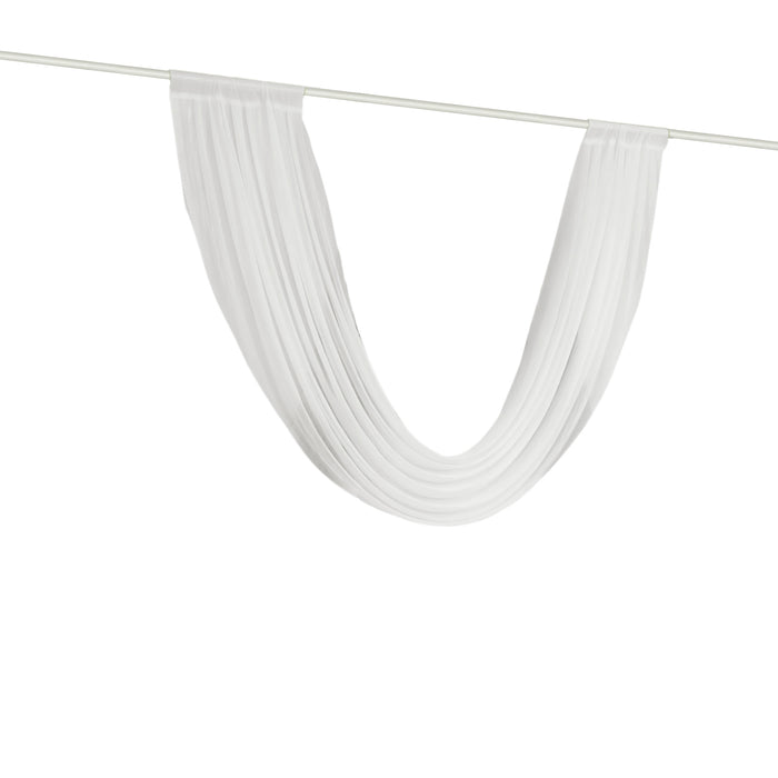 White sheer curtain draped on a rod, showcasing its flowy texture.