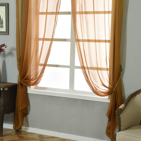 Amber sheer curtains by a window