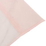 Close-up of pale pink fabric corner with soft textured surface
