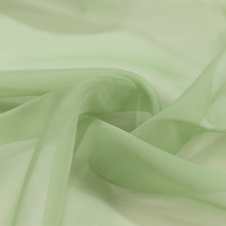 Light green sheer fabric with soft folds and translucent texture#whtbkgd