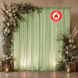 Green floral wedding backdrop with candles and lanterns, flame retardant curtains