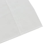 White folded sheet or fabric close-up on isolated background