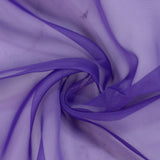 Sheer purple tulle fabric texture with elegant swirling folds#whtbkgd