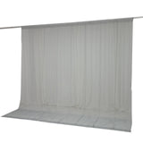 Light gray sheer curtain panel hanging on a rod with floor-length drape#whtbkgd