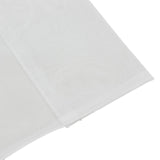 White folded fabric sheet close-up on a plain background