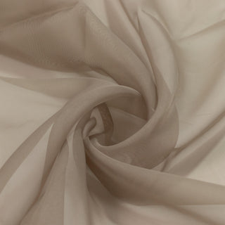 Beige sheer fabric texture with soft flowing folds and elegant drape#whtbkgd