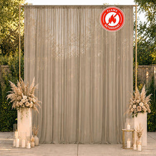Flame retardant sheer curtain backdrop with floral decor and candles