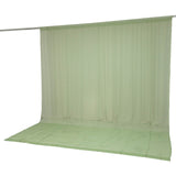 Light green backdrop curtain with floor panel on hanging rod