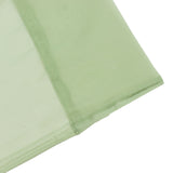 Light green sheer fabric close-up with stitched hem edges