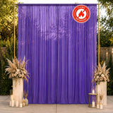 Purple flame-retardant curtain backdrop with floral wedding decor outdoors