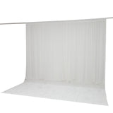 White sheer curtain panel with rod pocket and floor-length paneling