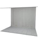 Gray photography backdrop curtain with floor sweep on support stand
