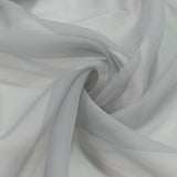White sheer fabric swirl texture close-up, soft elegant textile background