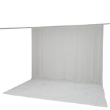 White photography backdrop curtain with seamless floor sweep on a stand
