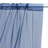 Sheer navy blue curtain panel hanging from a rod