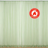Wide light green sheer curtain set on white background. #whtbkgd