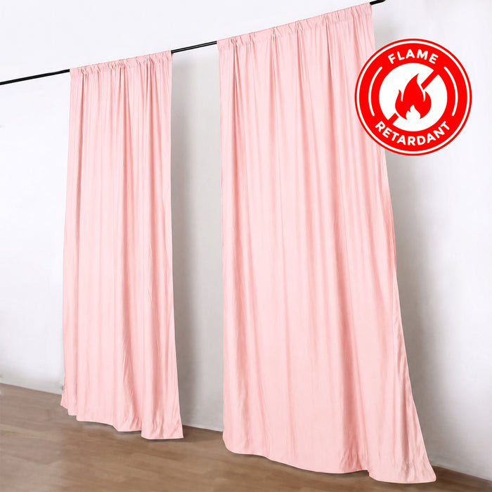 Pink flame retardant curtains on rod with fire safety badge