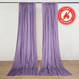 Purple flame retardant curtains hanging on a wall, fire safety certified fabric display
