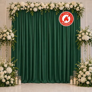 Elegant green floral wedding backdrop with white roses and candles