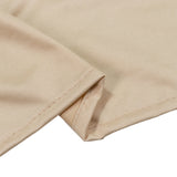 Beige ribbed knit fabric close-up with hem detail